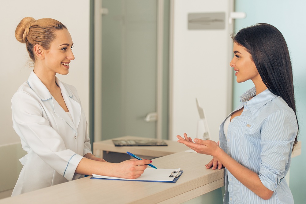 a doctor talking to her patient