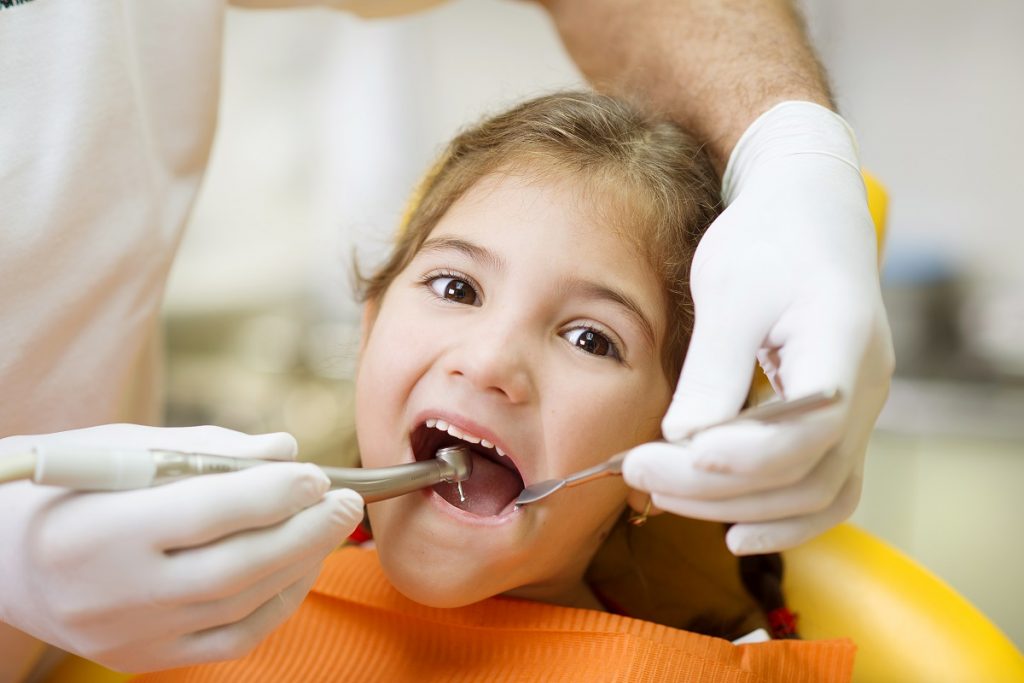 child in dental clinic