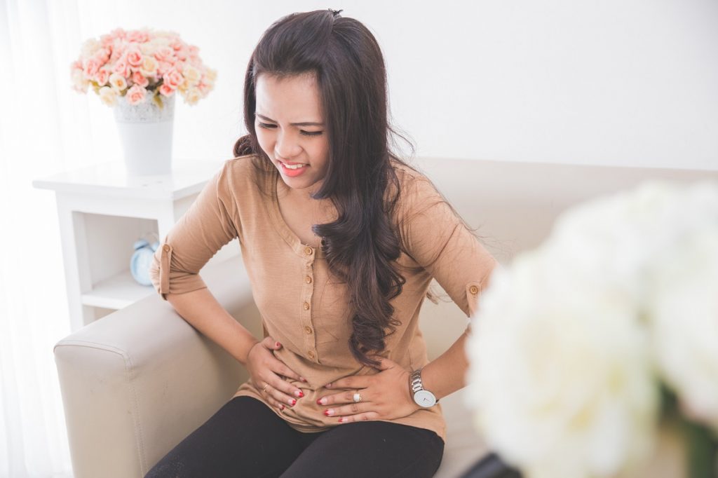 woman having stomachache