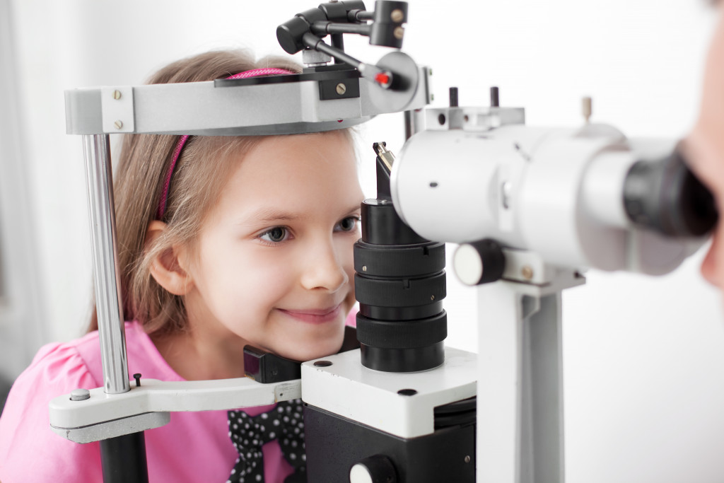 child in an eye doctor