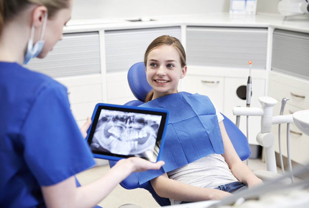 a woman and a dentist