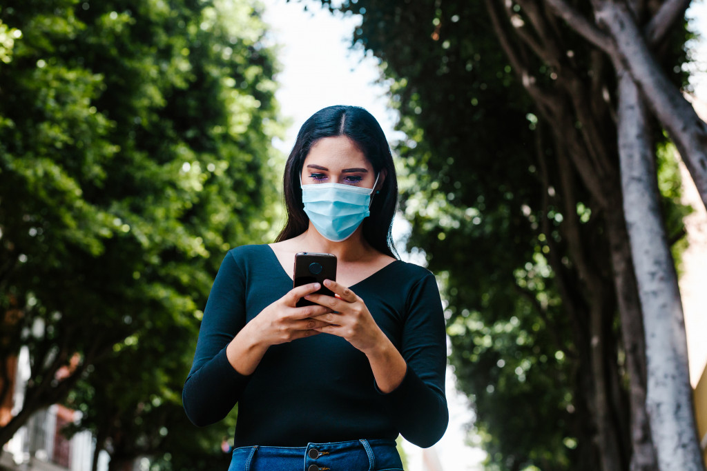 woman texting on her phone