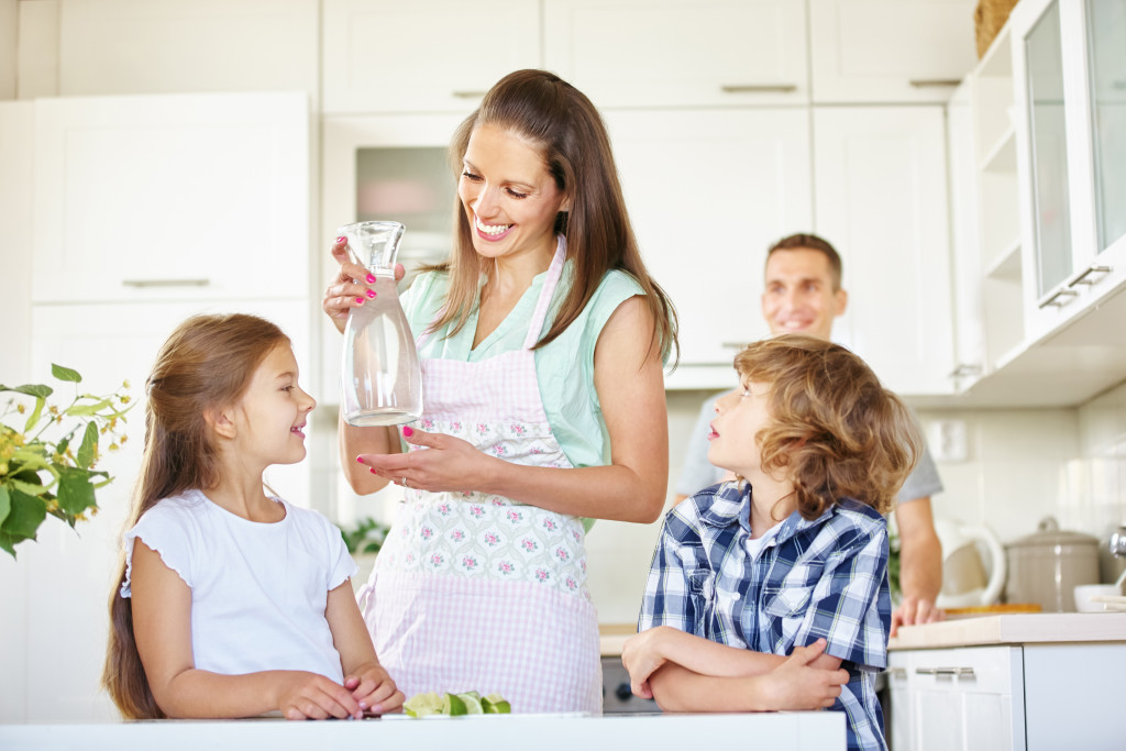 mother giving milk to her children